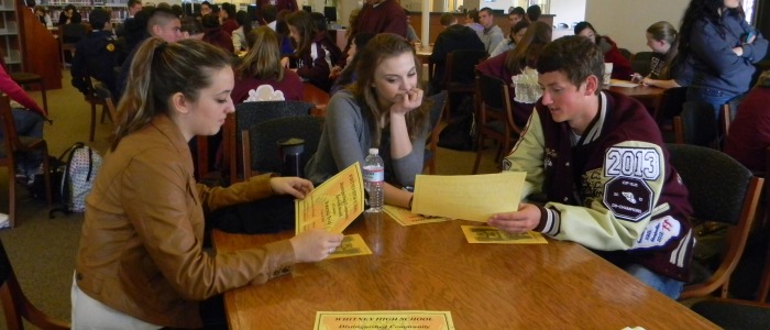 Distinguished Community Service award recipients Amanda Brae, Megan Murphy and Jacob Zufelt relax during the award's breakfast on Mar. 20. Photo by SHAI NIELSON
