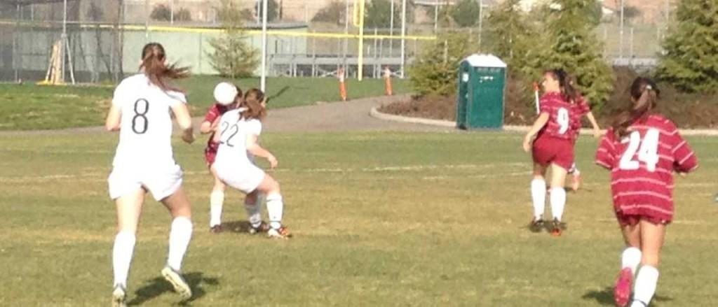 Tara Armstrong facing off against a Granite Bay opponent