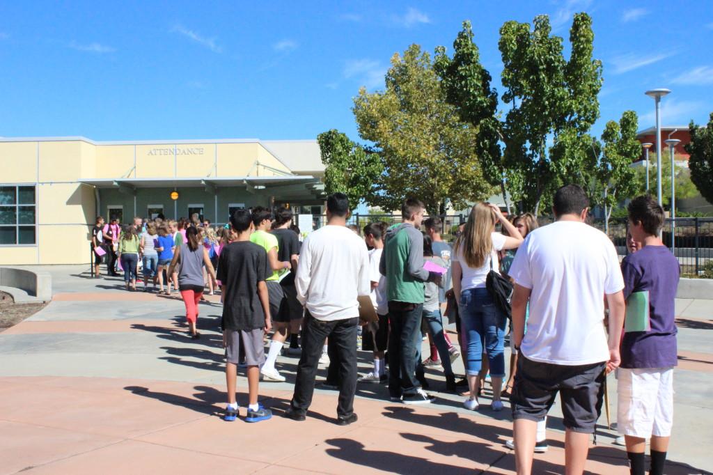 Incoming freshman line up to turn in their emergency forms photo by SAVANNAH HOUDEK