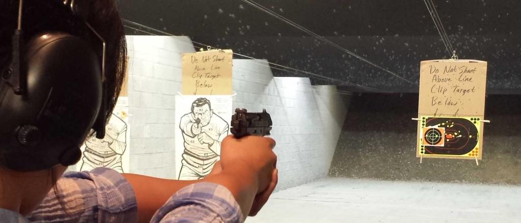 Theresa Kim shooting a .22 semi automatic for the first time at the Gun Range. PHOTO BY CHRISTINA KIM