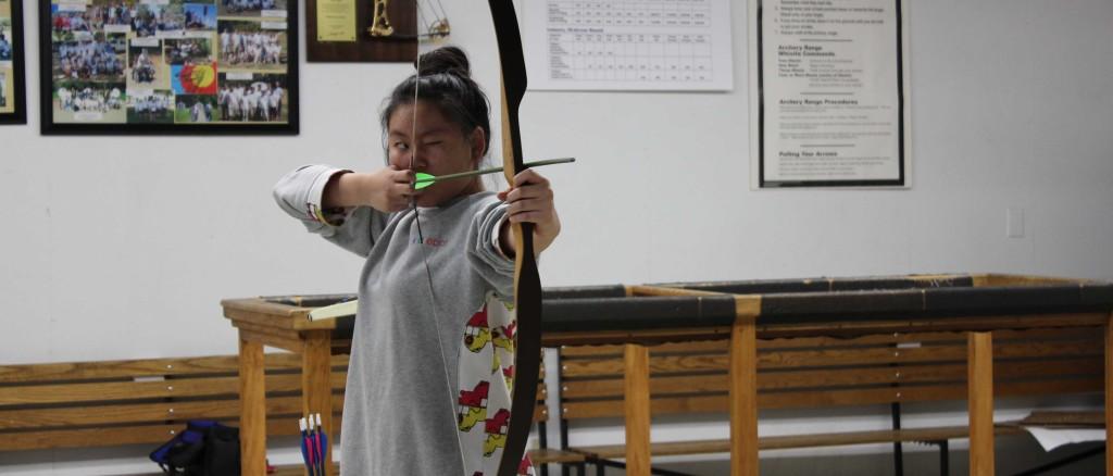 Theresa Kim shoots her first bow on Oct. 15. Photo by CHRISTINA KIM