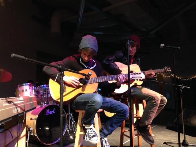 Michael Binford (left) and Tristan Akkerman (right) perform an instrumental at Unplugged Dec. 11. Photo by KAVLEEN SINGH