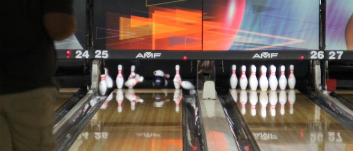 Thomas Murray receives a strike during the GSA USBC 9th Annual Junior/Adult  Tournament at AMF Landpark Lanes in Sacramento.