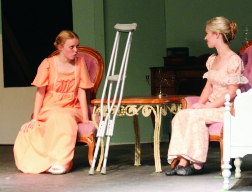 Isabelle Wheeler on stage as Harriet with  Sarah Goulette as Emma. Picture by Ona Igbinedion