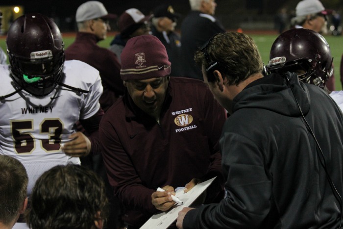 Coach Jesse Armas coaches the lineman when they are not playing. Photo by Daniel Sharrah.