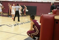 Men's varsity basketball falls to Woodcreek in first game of season