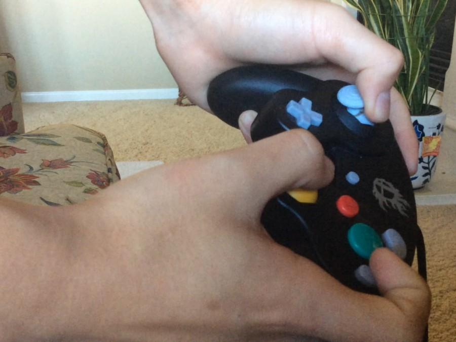 A Peach player practices float cancels in “Super Smash Bros Melee” for the Gamecube. Photo illustration by Benjamin Kim