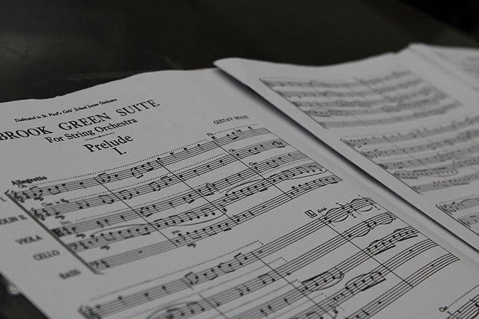 A picture of the music that the orchestra is playing this year. Photo by Rachel Larson