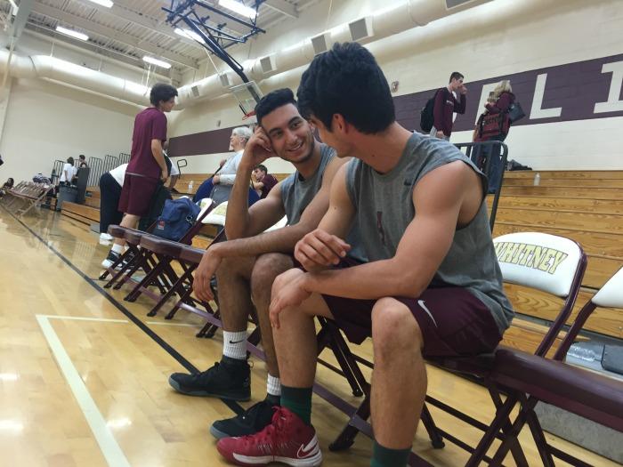 Gabe worthington and Armin Savoji  wait on the bench to be put in the game. Photo by Isabella Jacobs
