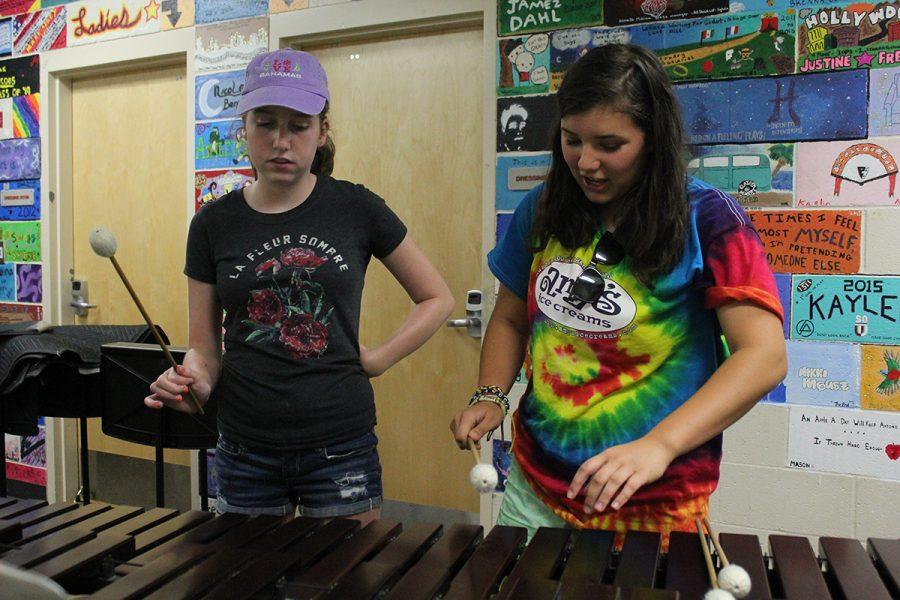 Julia Allwardt and Shelby Johnson plays xylophone. Photo by Maximo Esguerra