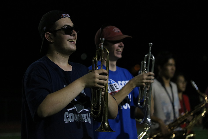 After making a joke, Eric Smith and Keegan McLean laugh during practice on Sept. 1. Photo by Morgan Hawkins 