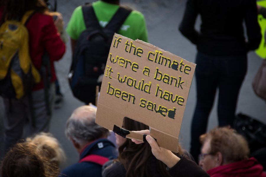 Photo depicting a poster at the Peoples Climate March in New York City. Photo by Nick Verlaan CC0 1.0