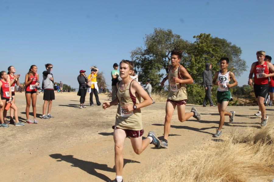 At Bella Vista, Jared Regan and Jeremia Nuez compete at their meet Oct. 14. Photo by Haley Bedrin. 
