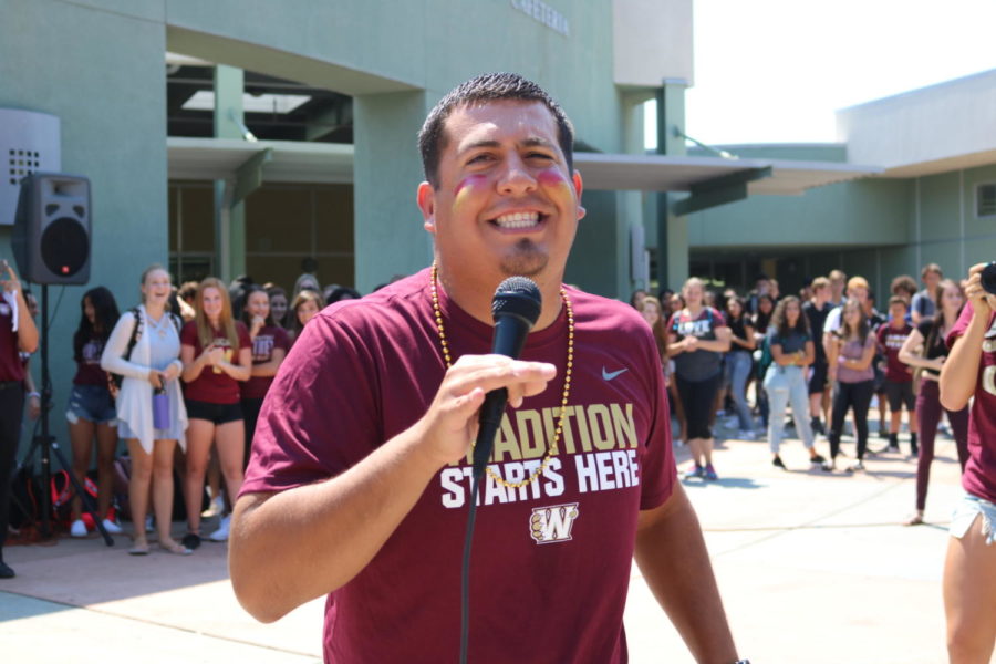 During the first lunch time activity of the school year Mr. Jesse Armas performs in a lip-sync battle. Photo from Whitney Update Archive

