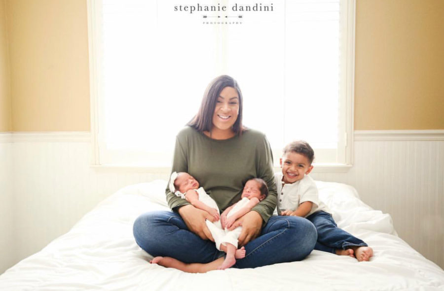As part of a monthly photo shoot Kali Tisdale poses with her children to show how much they have grown over the years, Tisdale sits on her bed with her three children, Daxxon Tisdale, Penelope Tisdale and Dawson Tisdale. Photo by Stephanie Dandini.

