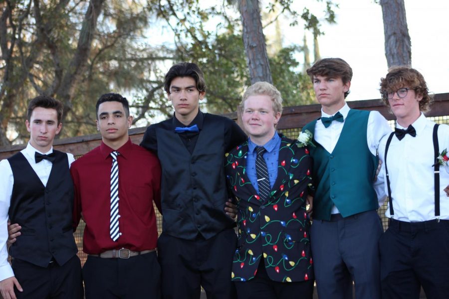 Before Rocklin’s Homecoming dance Sept. 29 Whitney students Ryan King, Bryce Simpson, Daniel Parker, David Brosnan and Bennett Woodward pose with Rocklin student Quincy Dungan. Photo by Adriana Williams.