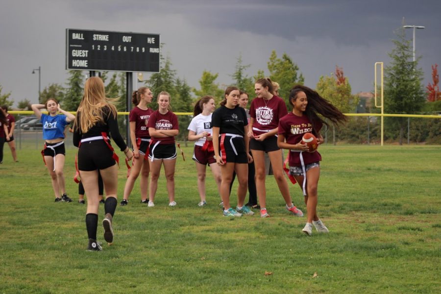 During the last powder puff practice before the game, the sophomore defensive players work to better their flag football skills. Photo by Annie Hsu.

