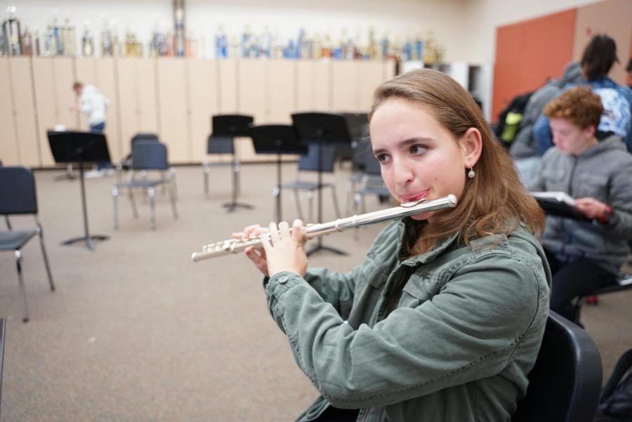 Rehearsing repertoire for the Capitol Section Honor Band on Jan. 12, Carina Geist practices in the band room at intervention. 