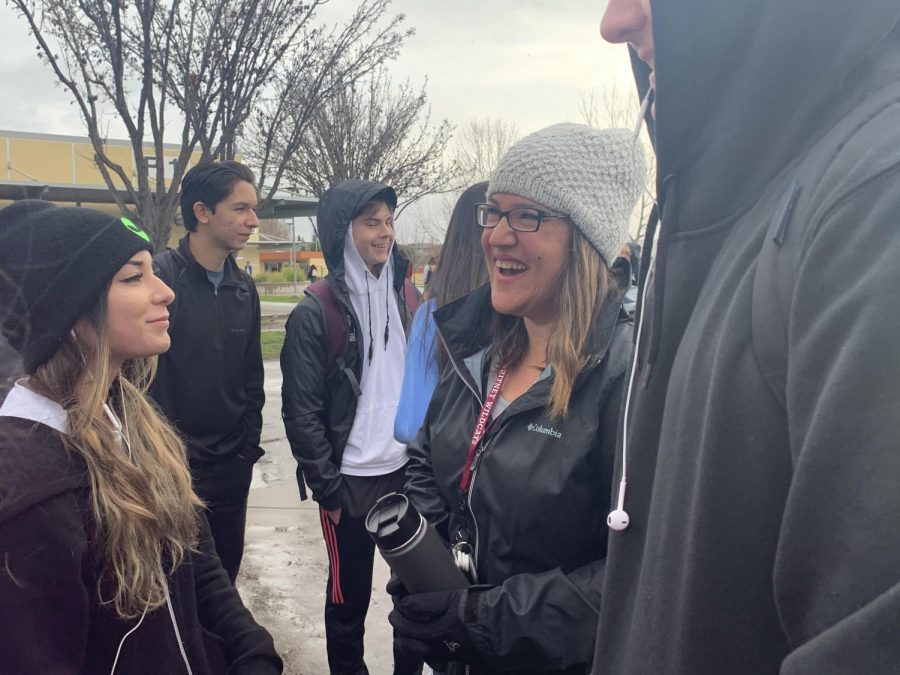 On Dec. 18, Mrs. Jessica Alacla talks to students to build relationships at break. “I am here because I want to be and because I want to build strong relationships with the students,” Alcala said. Photo by Natalie Damian
