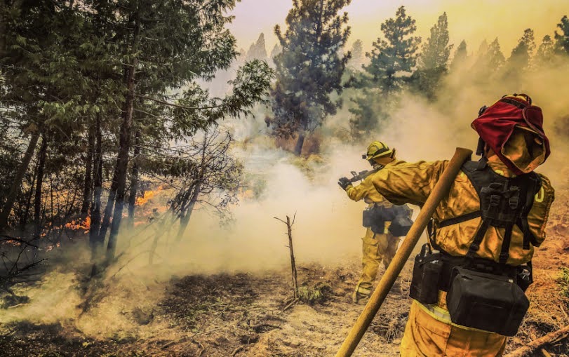 Chris Pombo helps fight the Creek Fire Sept. 9. Photo by Sunny Johnson.
