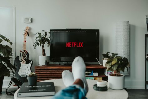 With extra time due to hybrid schedule and quarantine, Netflix can be used to procrastinate on the homework that should be done already. Photo by Mollie Sivaram from Unsplash.