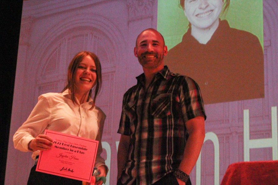 Mr. Joshua Ansley presents the award for “Best Ensemble Member in a Play” to Jayden Hass. Hass received the award for their involvement in Whitney’s fall production of William Shakespeare’s Macbeth. Photo by Maya Gomez.