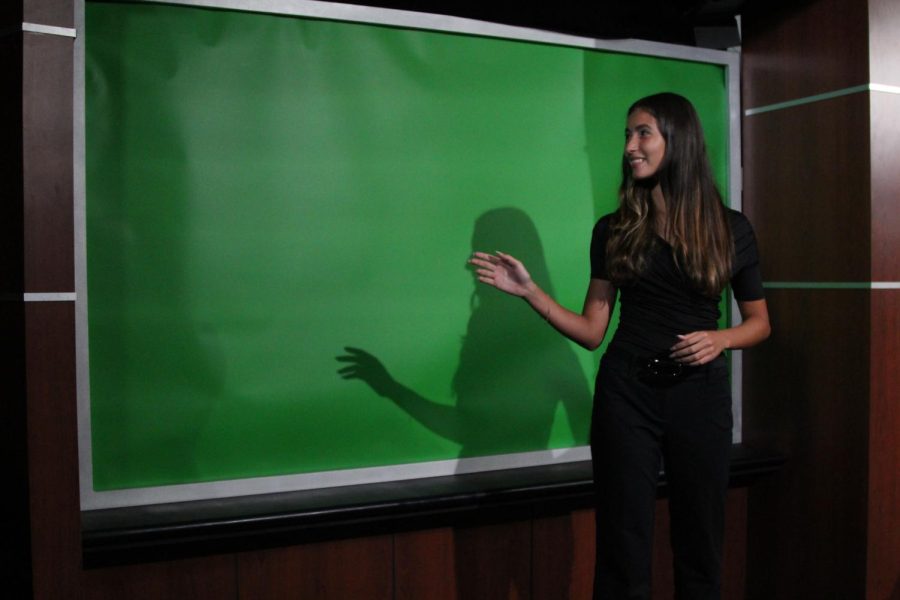 In the broadcasting room Karina Pate rehearses for upcoming broadcasts during PAWS Sept. 21. Photo by Desiree Montejano