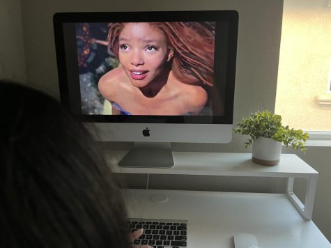 Trina Tang watches The Little Mermaid live action teaser trailer on YouTube. Photo by Nicolle Valite.