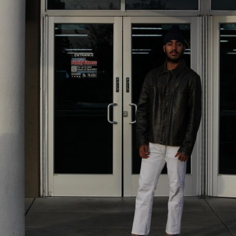 Karan Singh stands in front of the gym California Family Fitness.