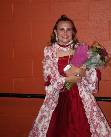 This photo was taken after the Little Women play in Whitney High School’s theater . It shows Ashtyn Ogden in her character’s costume.