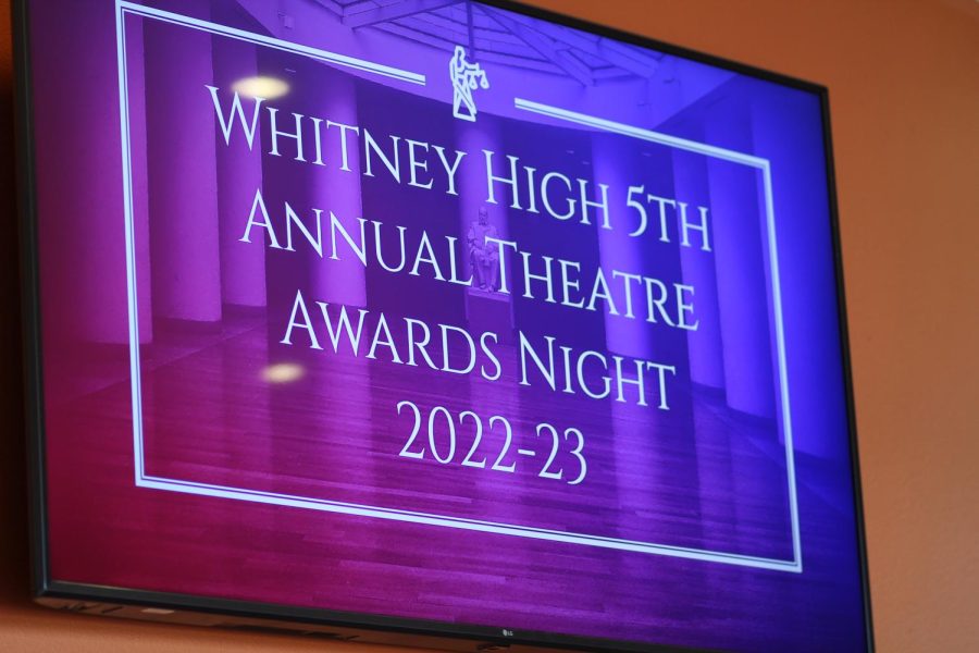 As theatre students walk into the theater hall, they are greeted with a formal title slide on the TV to announce the event. Photo by Wynette Calunsag.