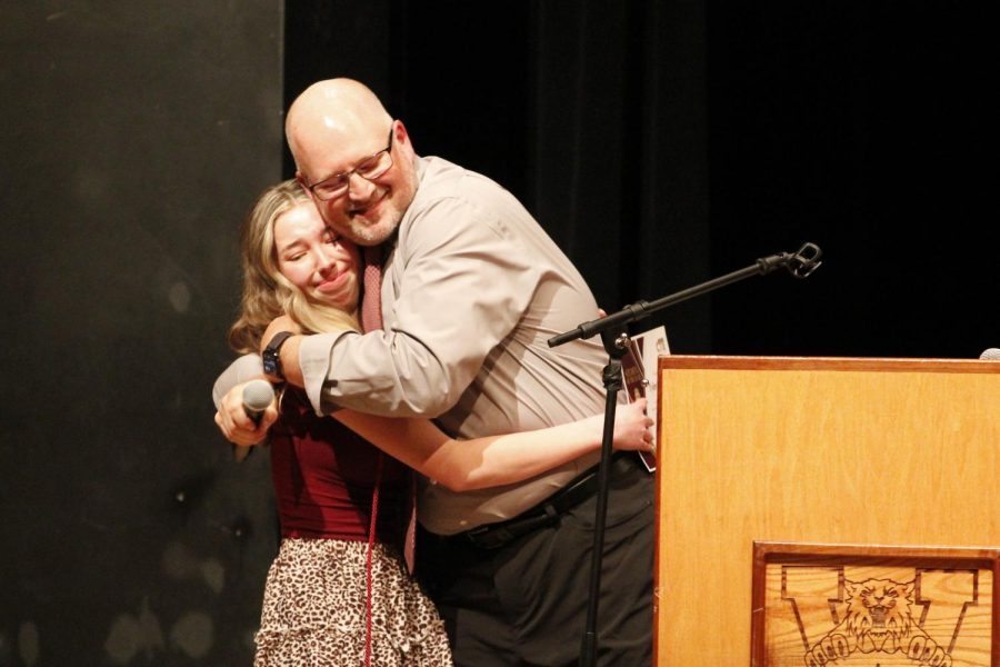 A hug is shared between Tyler Williams Mr. Ben Barnholdt to celebrate winning the Student of the Year Award for all CTE students. Photo by Alexandra Bosano. 