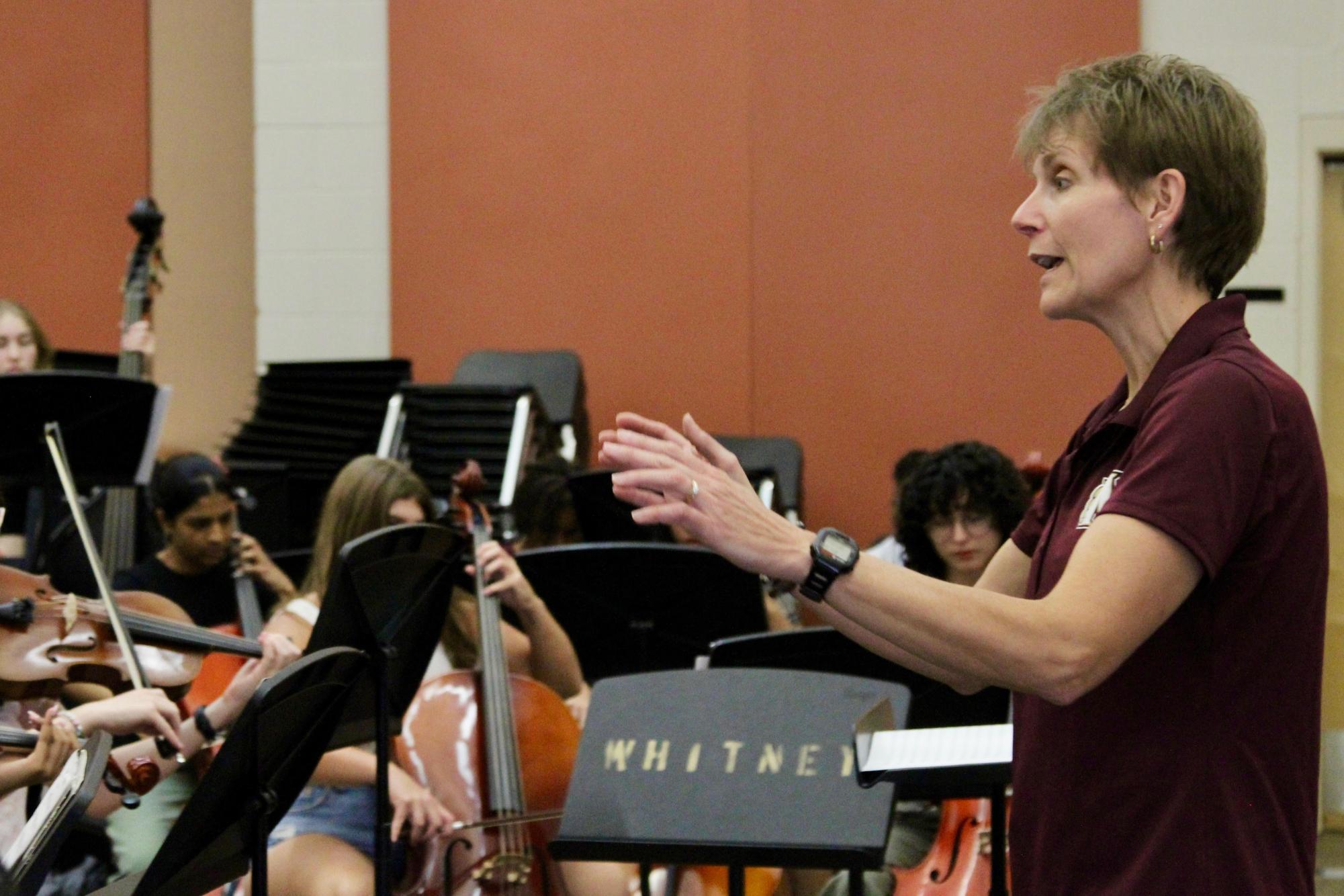 During third period in the band room Aug. 28, Mrs. Michelle Jamieson conducts the band through “Ancient Airs and Dances.” Jamieson was hired to take over and redevelop the music program.