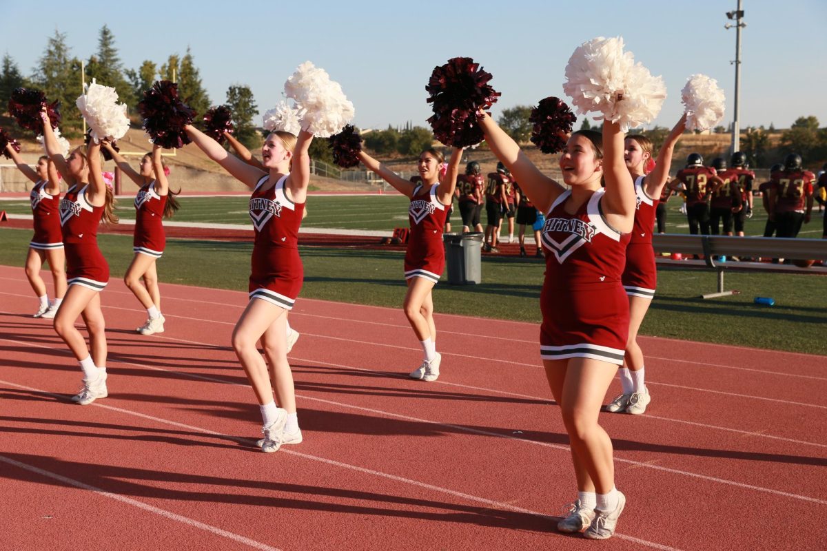 During the frosh/soph football team’s last home game against Oak Ridge Oct. 19, the JV cheer team starts a defensive chant. The team lost 51-14. Photo by Natalie Deeble