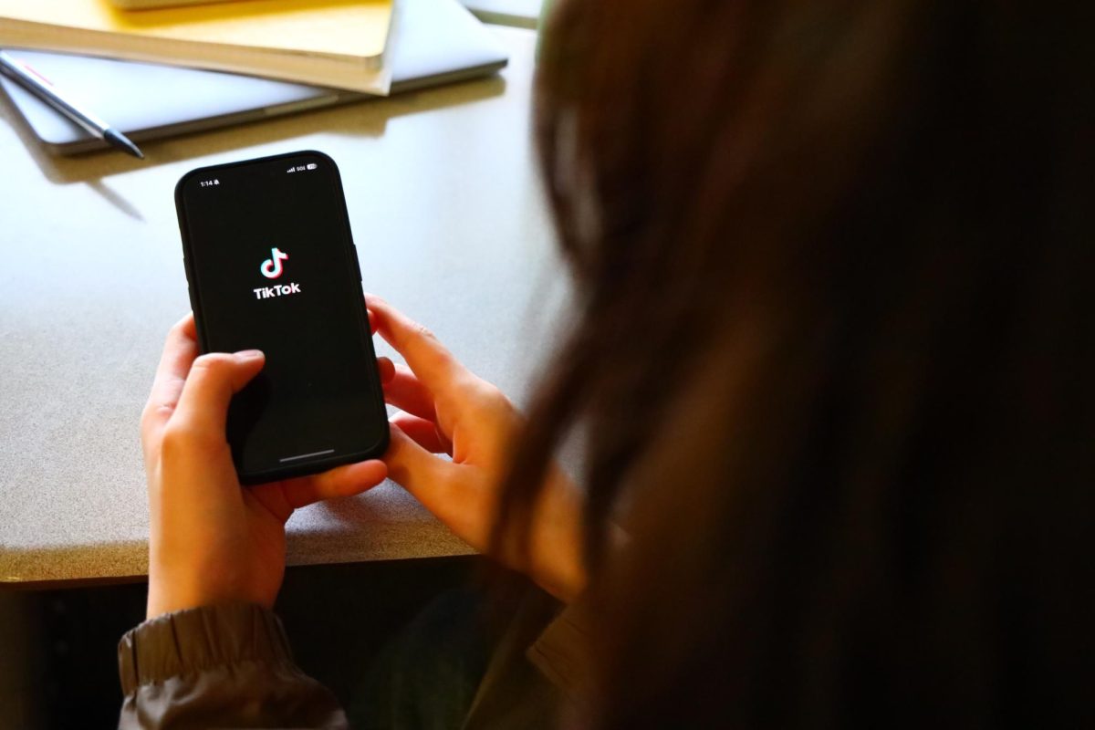 In Mr. Joel Williams’ fifth period precalculus/trigonometry Honors class, Presley Ries opens the TikTok app to scroll on the “For You” page to pass the time left in class. Photo by Alexis Dashnyam